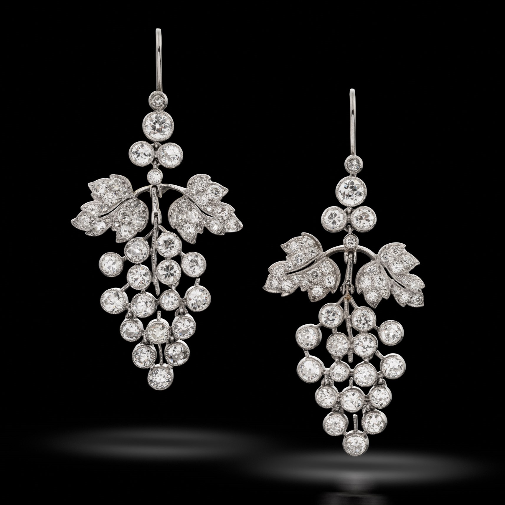 A pair of early 20th century diamond pendant earrings, circa 1910