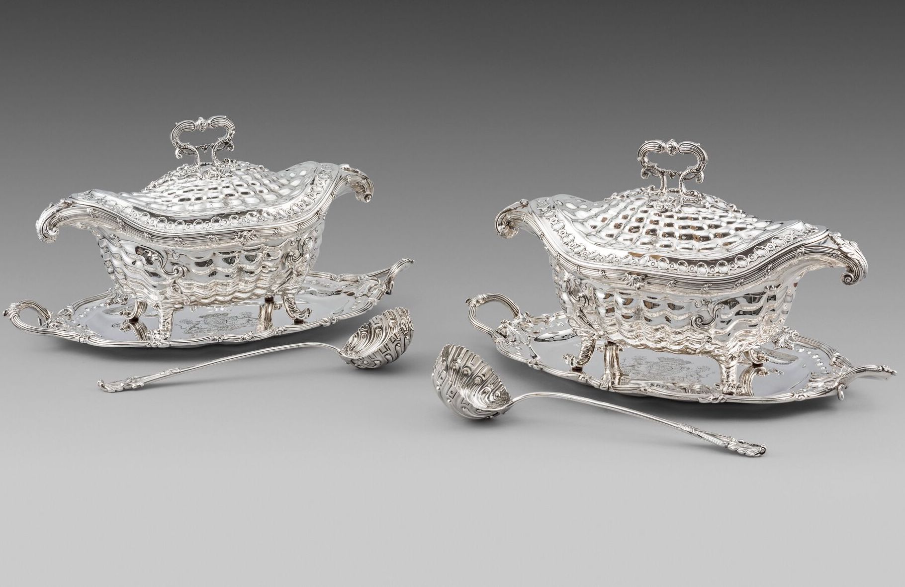 A Highly Important Pair of Soup-Tureens, Covers, Stands & ladles