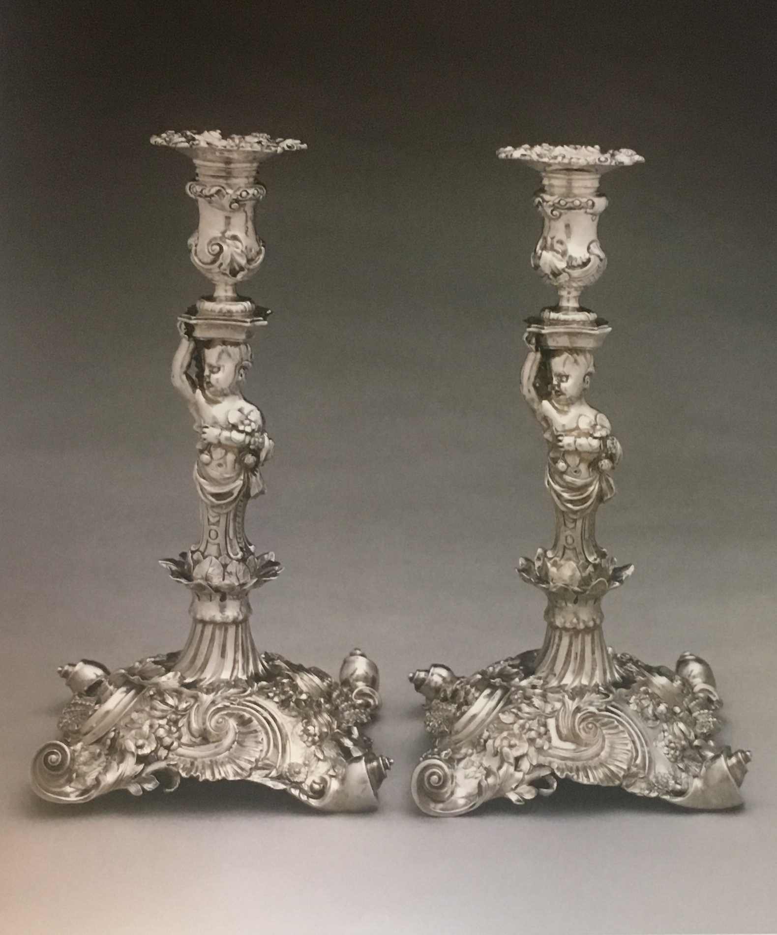 A Highly Important Pair of Figural Candlesticks