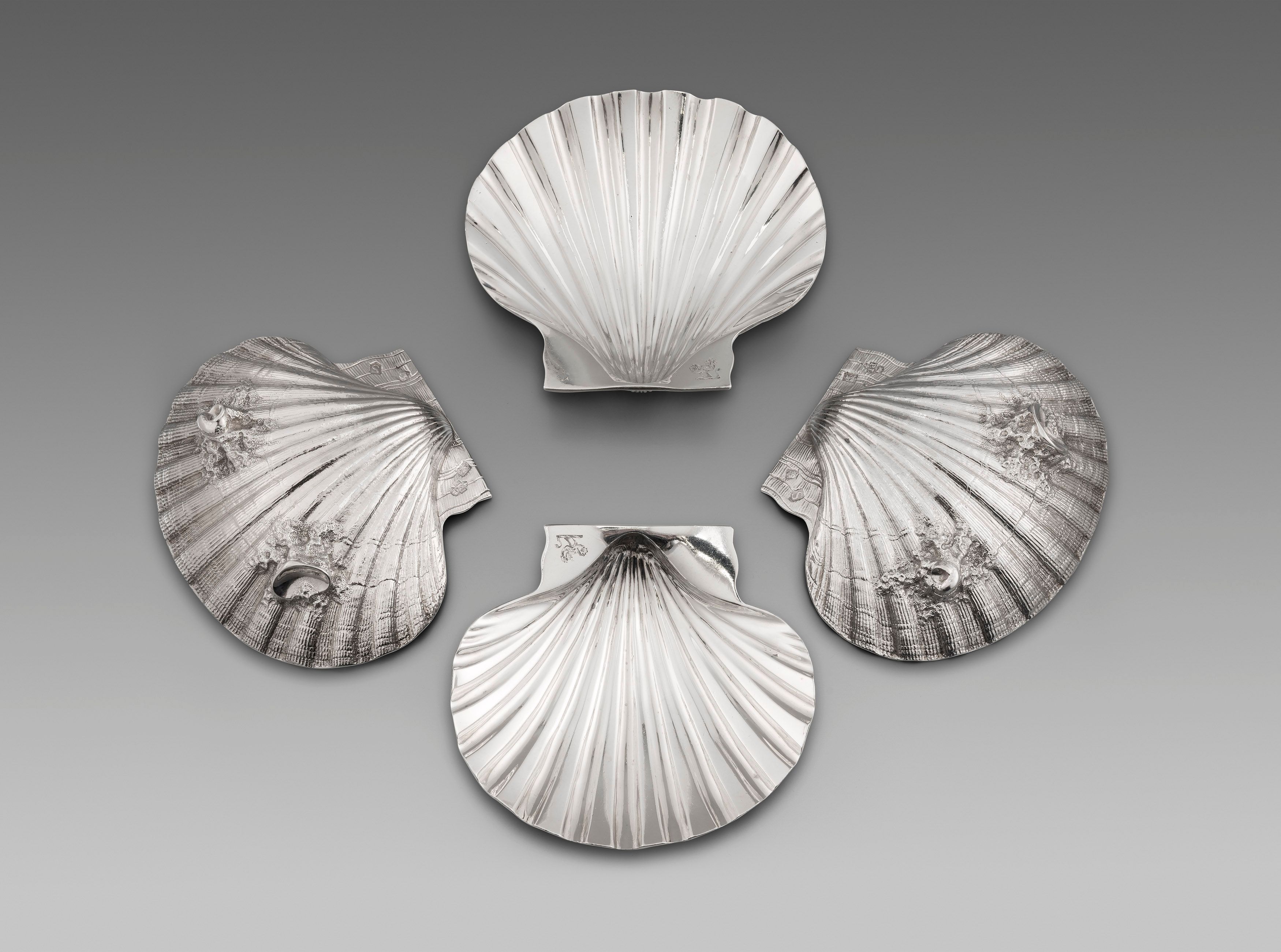 A Set of Four Paul de Lamerie Butter Shells 