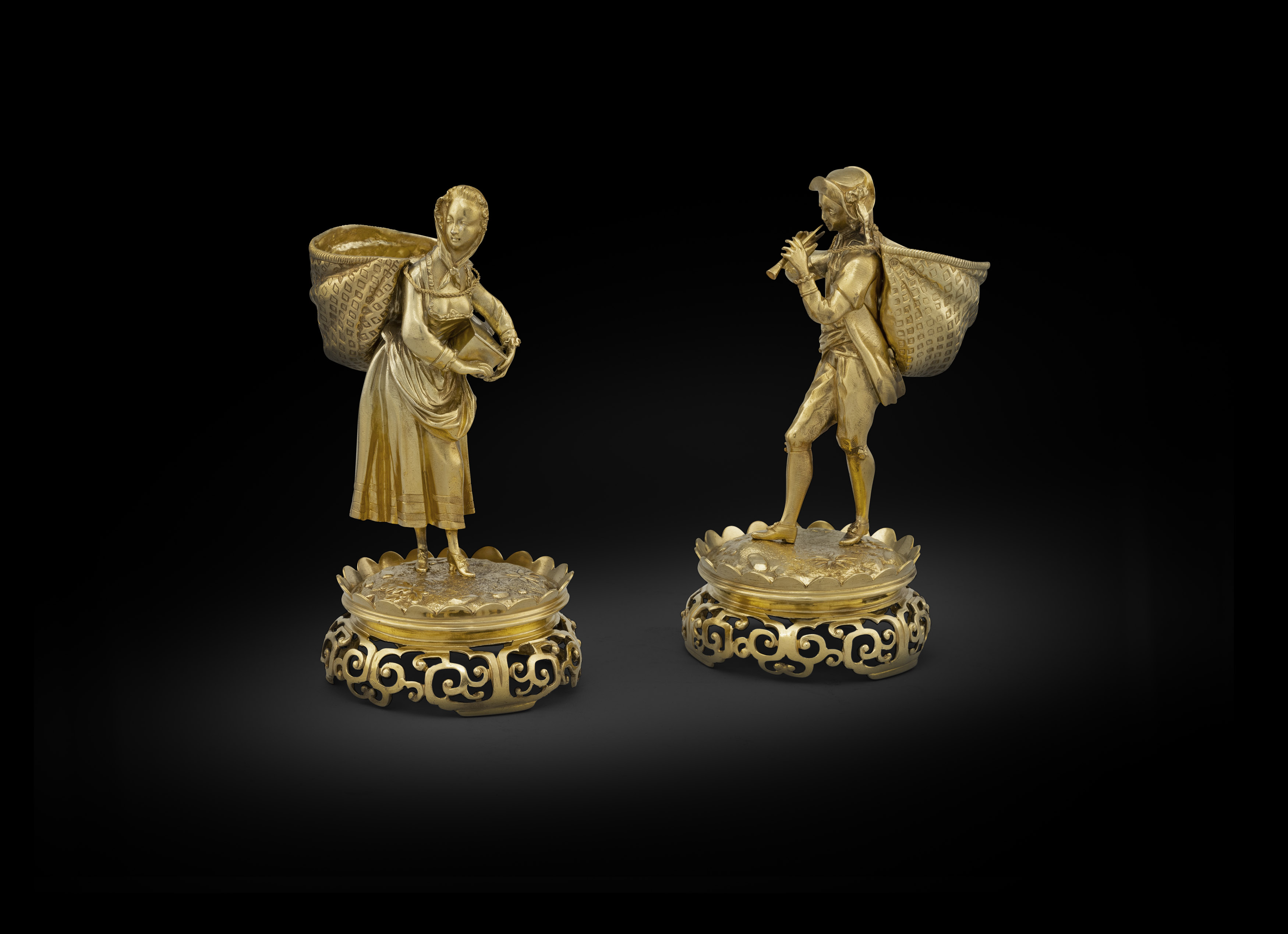 A Pair of Victorian Silver-Gilt Figural Table Ornaments