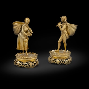 A Pair of Victorian Silver-Gilt Figural Table Ornaments