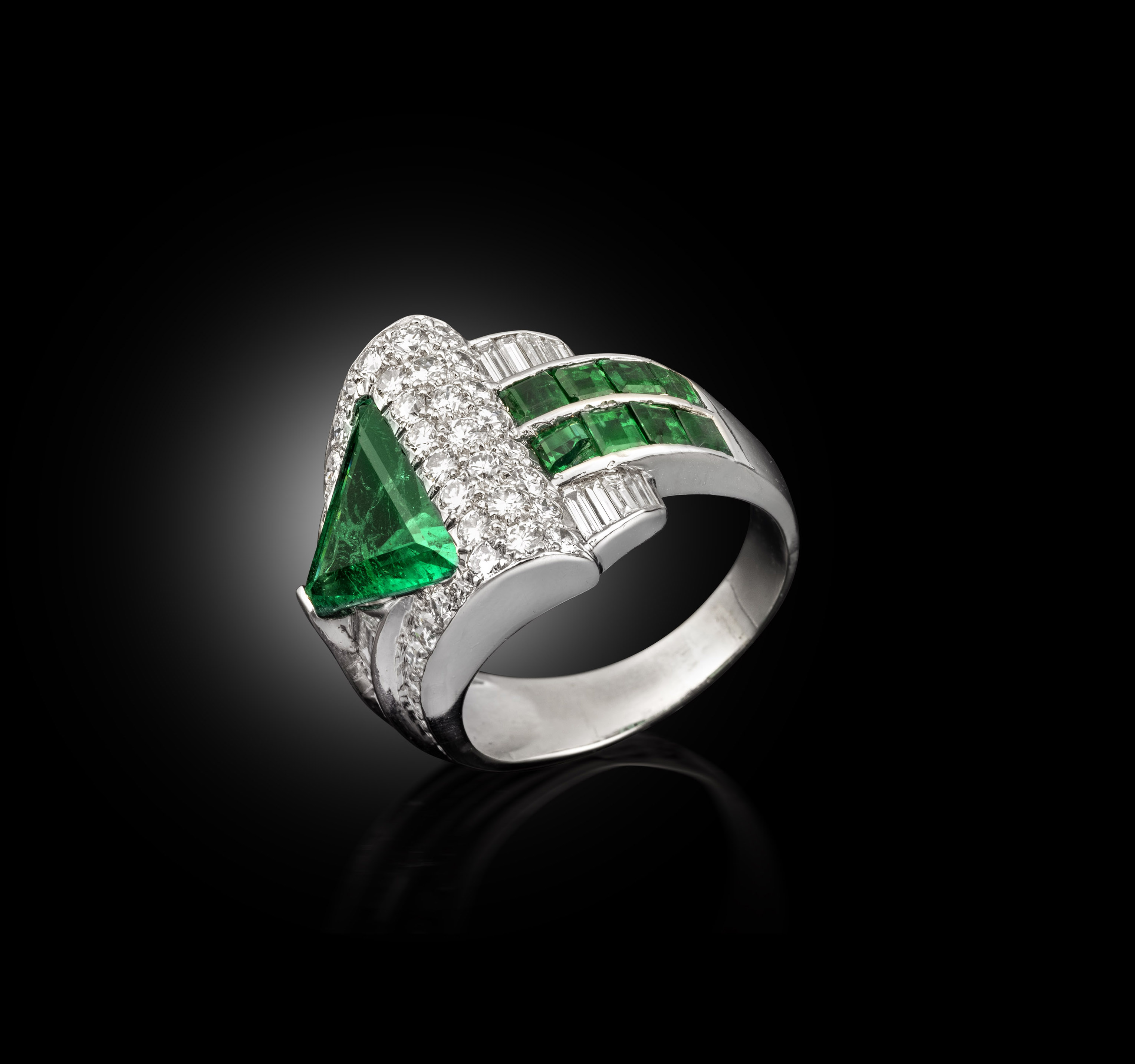 An emerald and diamond ring, circa 1930