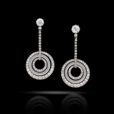 A pair of art deco diamond and rock crystal ear pendants, circa 1920