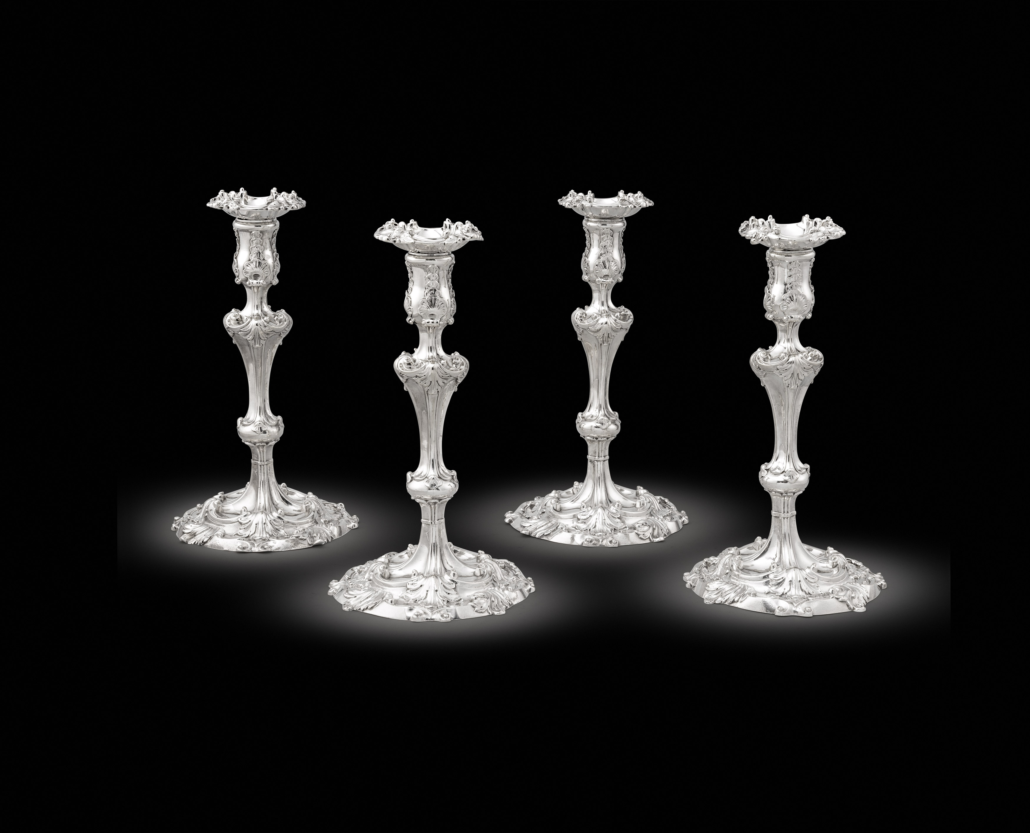 A Set of Four George II Candlesticks
