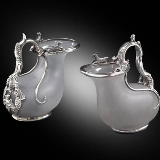 A Pair of Silver-Mounted Ascos Jugs