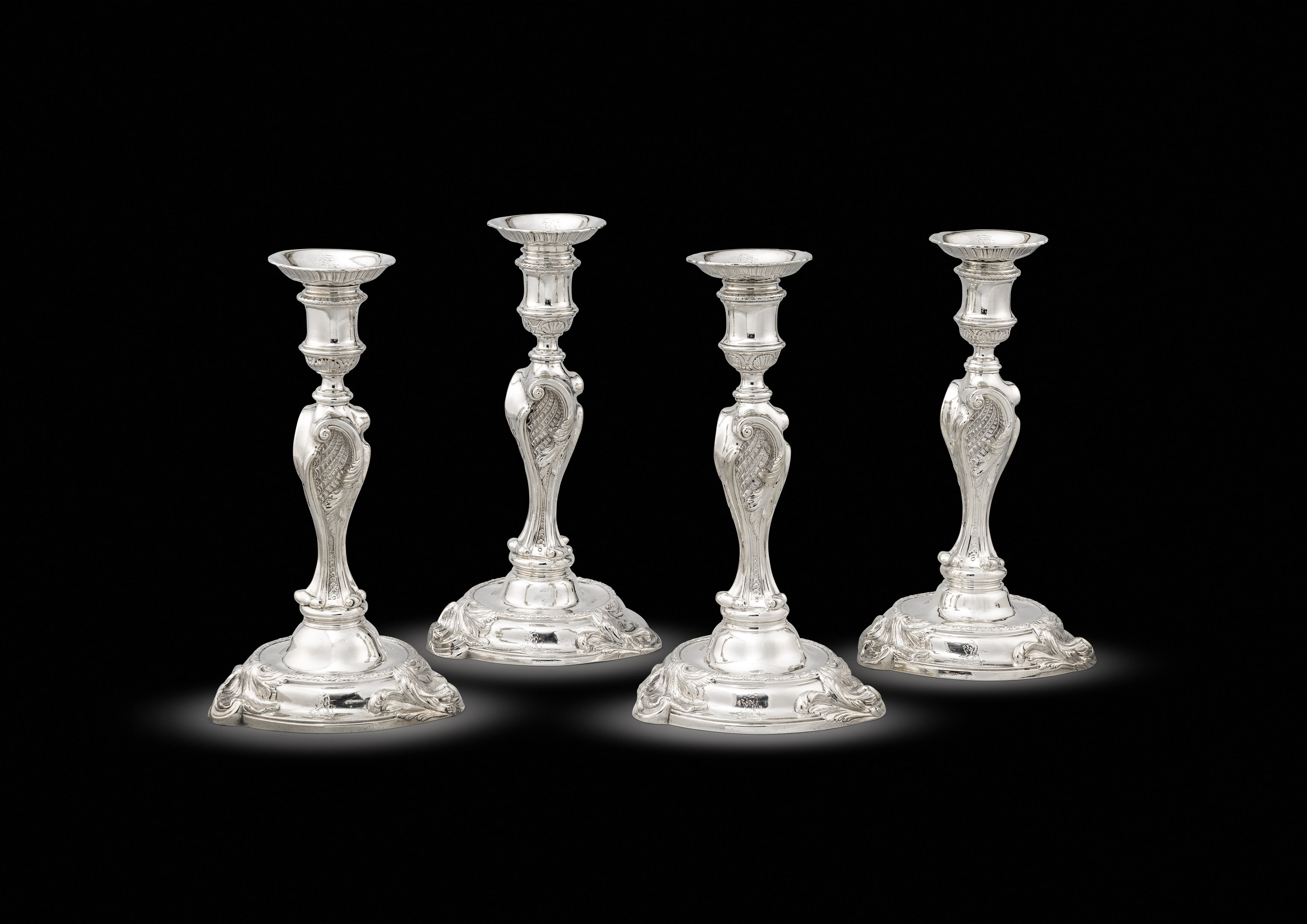 A Set of Four George II Candlesticks