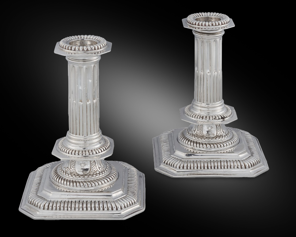 A Pair of Square Base Column Candlesticks 