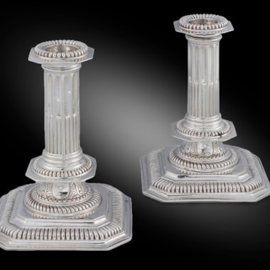 A Pair of Square Base Column Candlesticks