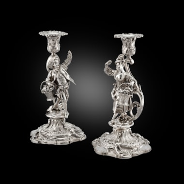 A Pair of Figural Candlesticks
