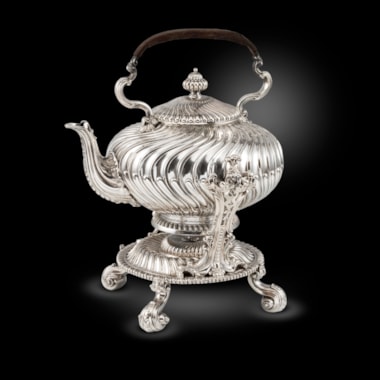 A Swirling Fluted Kettle on Stand