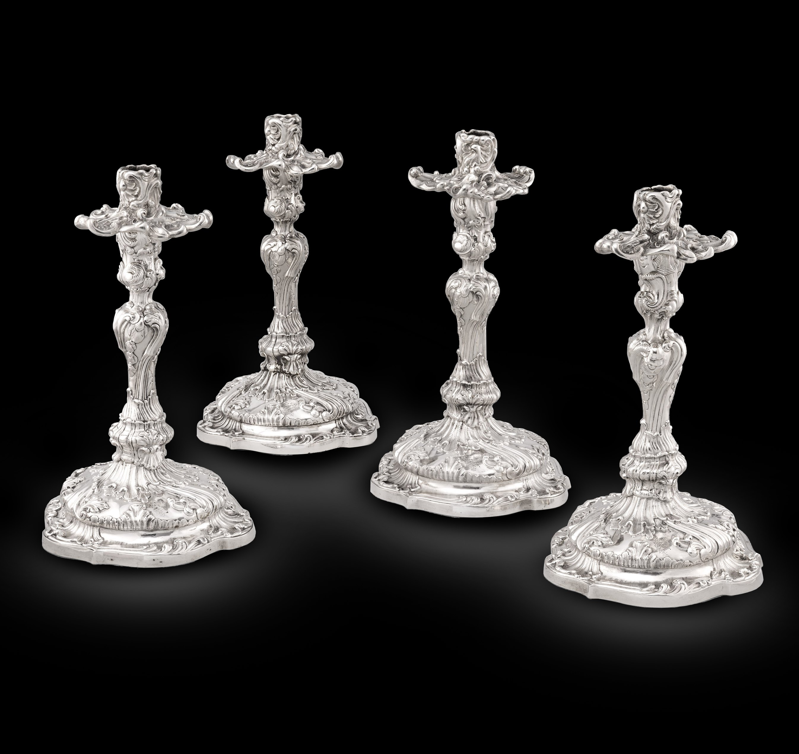 A Set of Four German Rococo candlesticks, Dresden, circa 1900