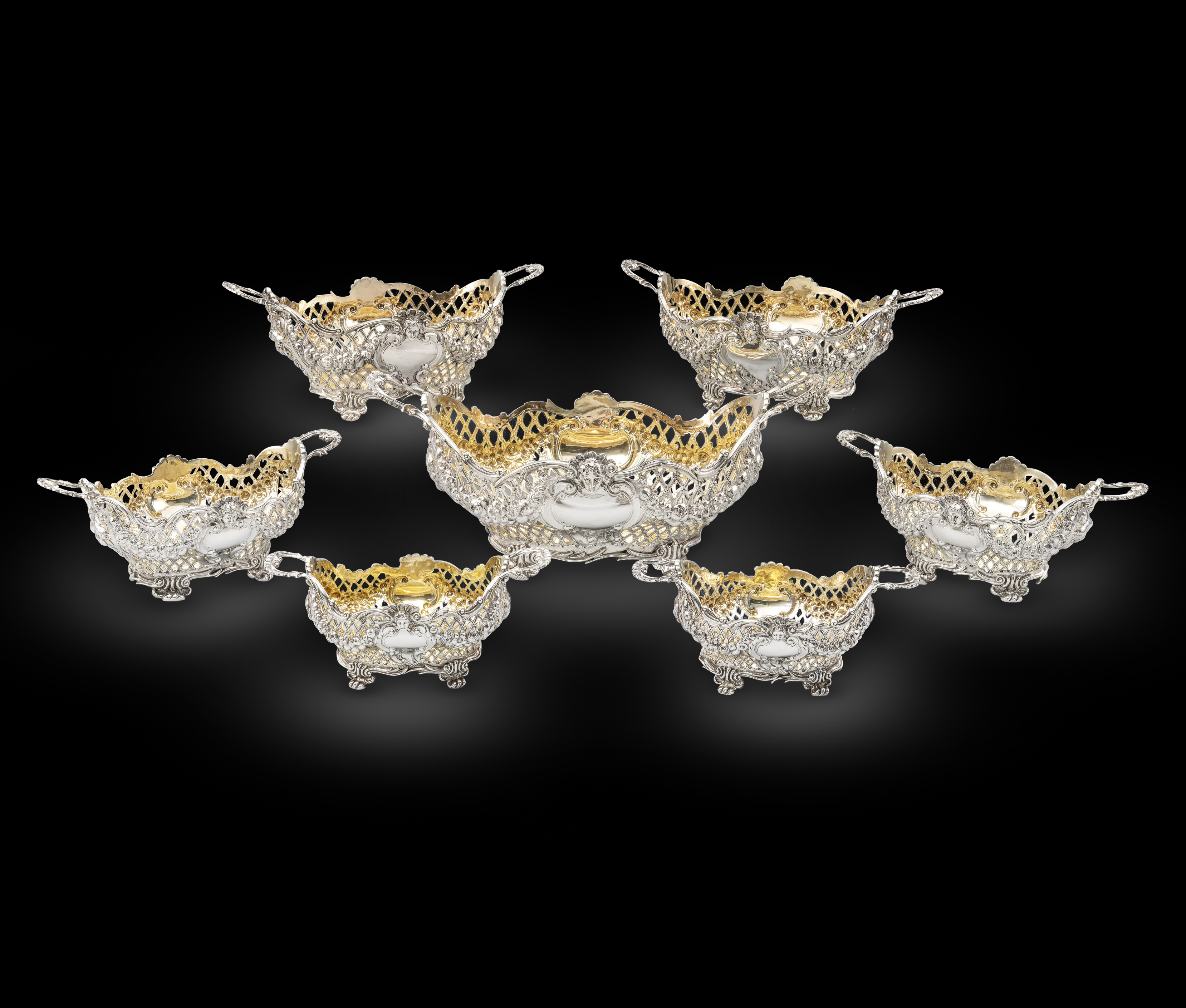 A Suite of Seven Victorian Silver Baskets 