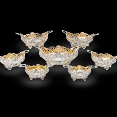 A Suite of Seven Victorian Silver Baskets