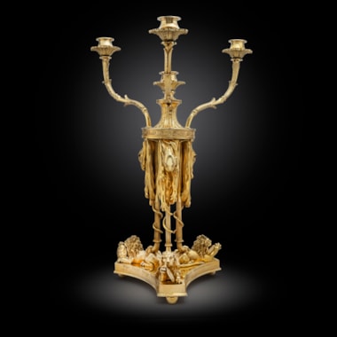 A George III Silver-Gilt Four-Light Candelabrum