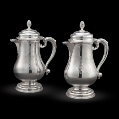 A Pair of George II Silver Jugs