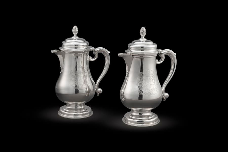 A Pair of George II Silver Jugs