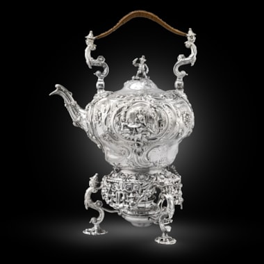 A George II kettle, stand and lamp in the Chinoiserie taste