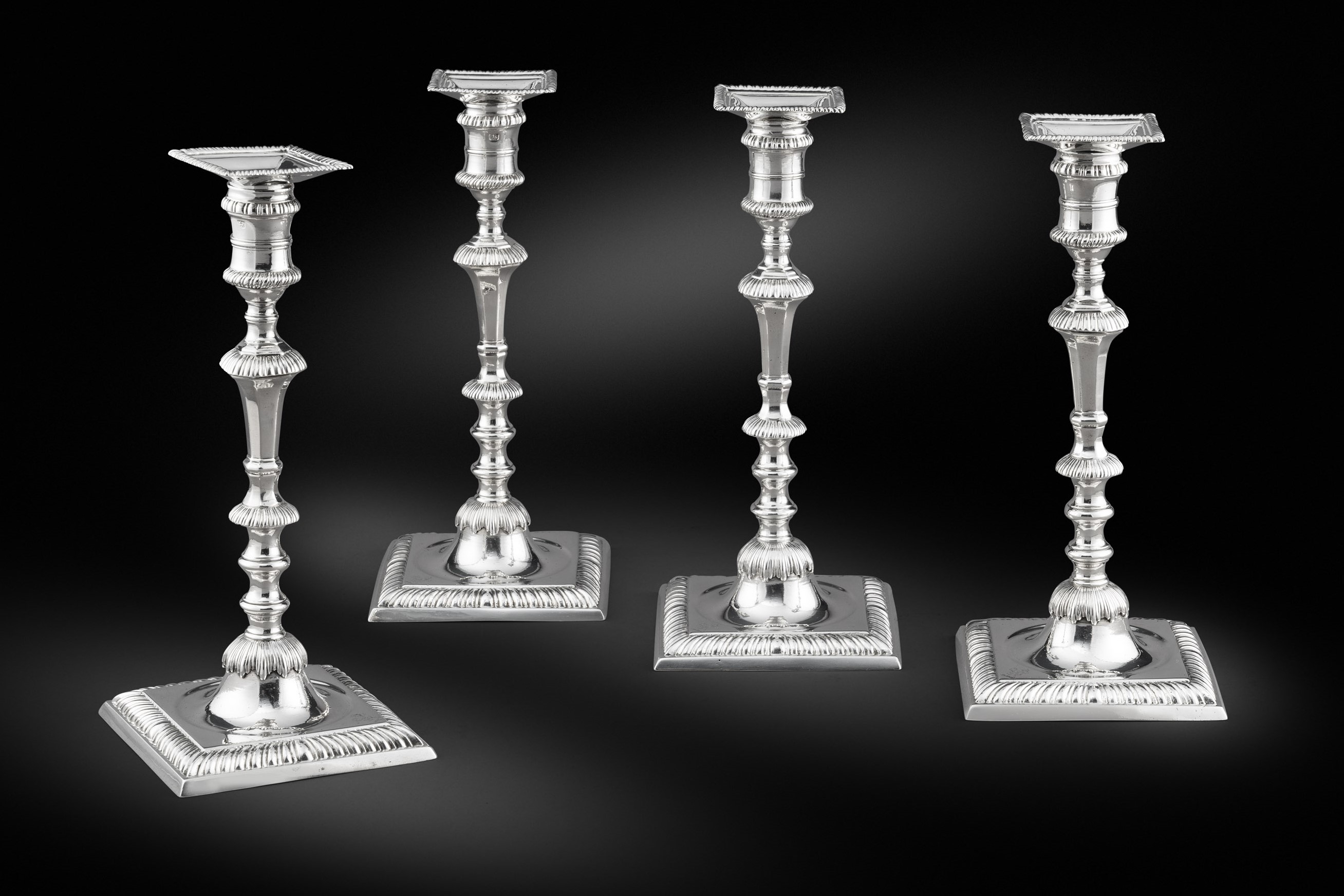A set of Four George II Candlesticks