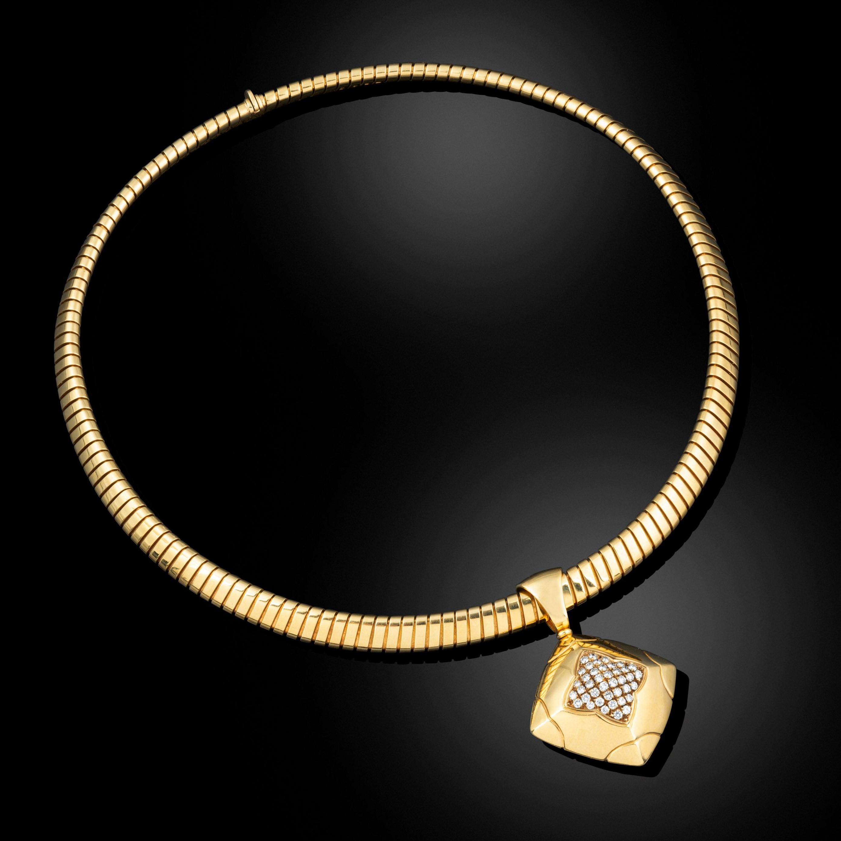 A tubogas chain with diamond set pendant