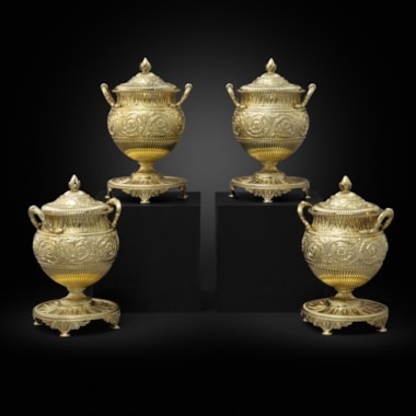 A Set of Four George III Silver-Gilt Sugar Vases and Covers