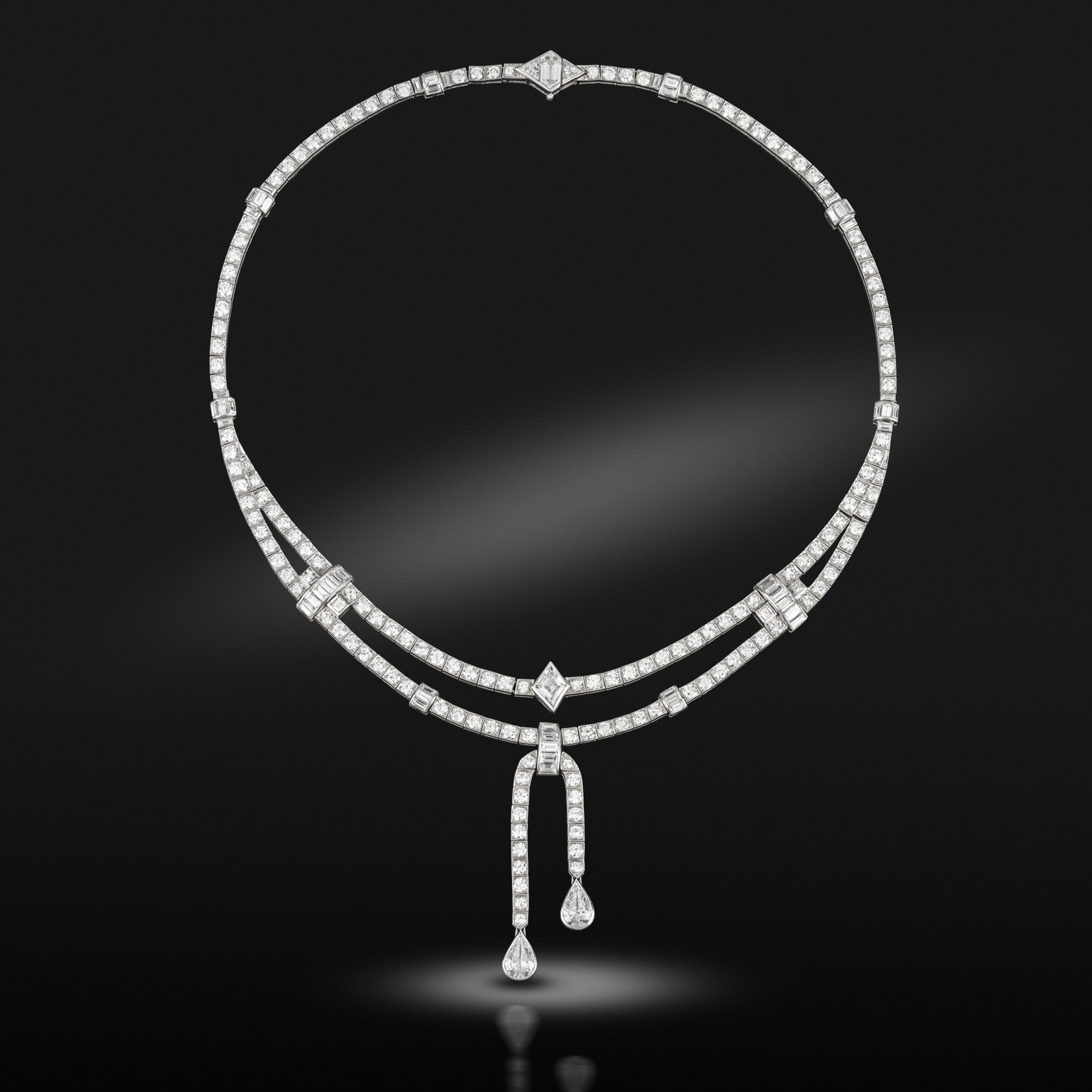 An early 20th century platinum and diamond necklace