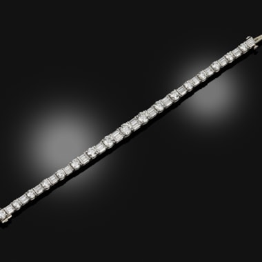 A platinum and diamond line bracelet, 1930s