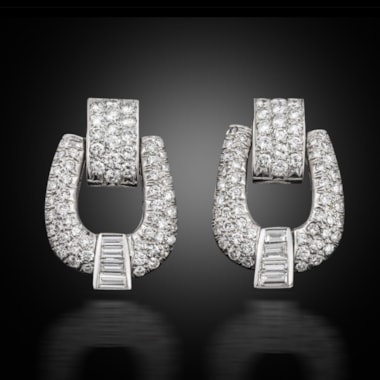 A pair of diamond ear clips, 1940s