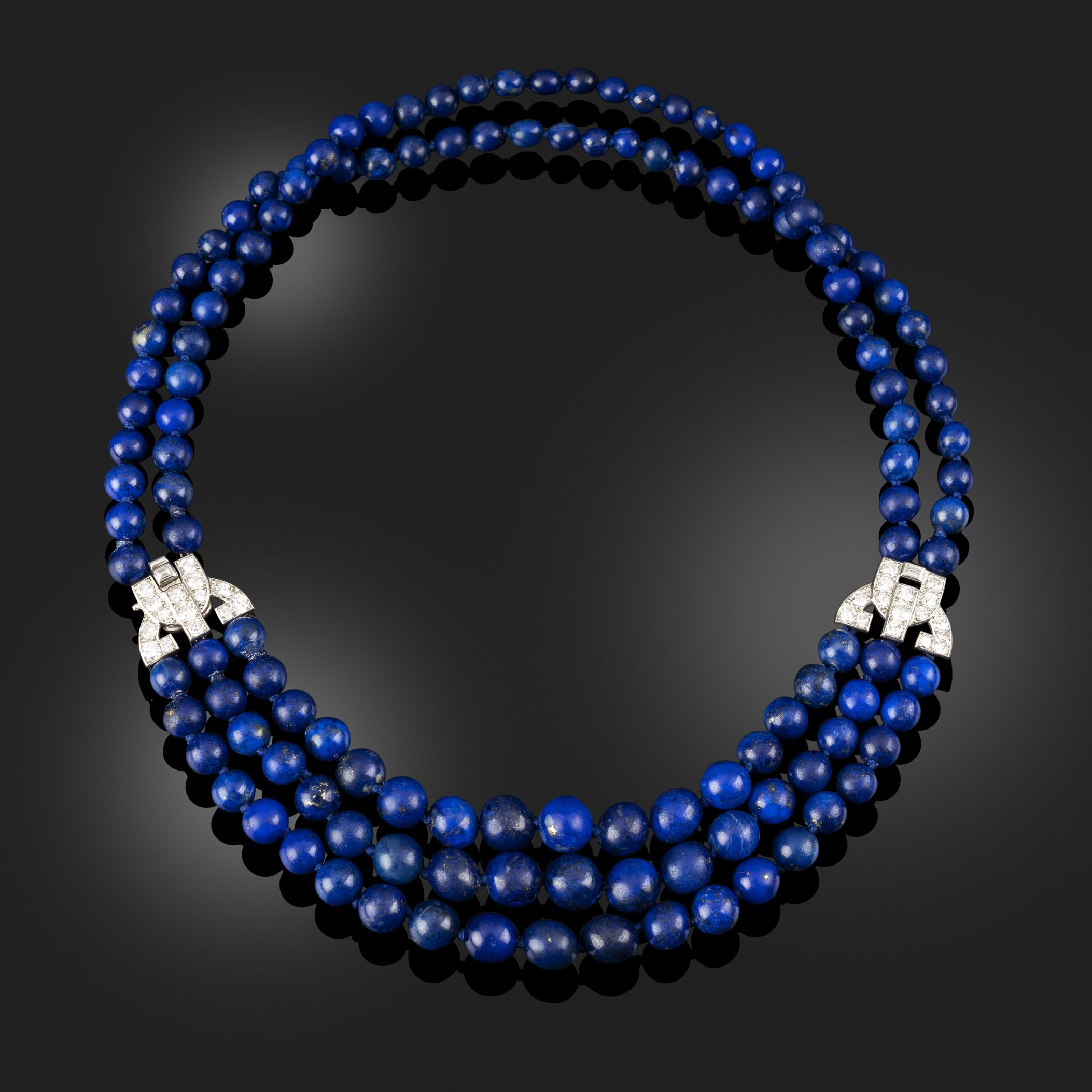 A lapis lazuli, platinum and diamond necklace, circa 1935