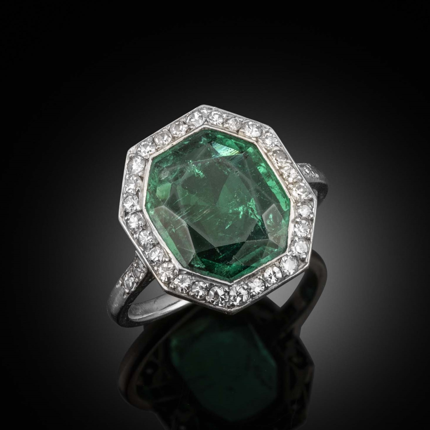 An early 20th century emerald and diamond ring, circa 1910