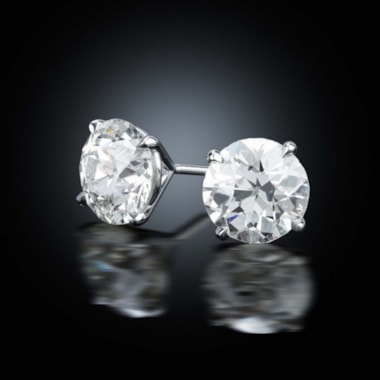 A pair of old European cut diamond studs