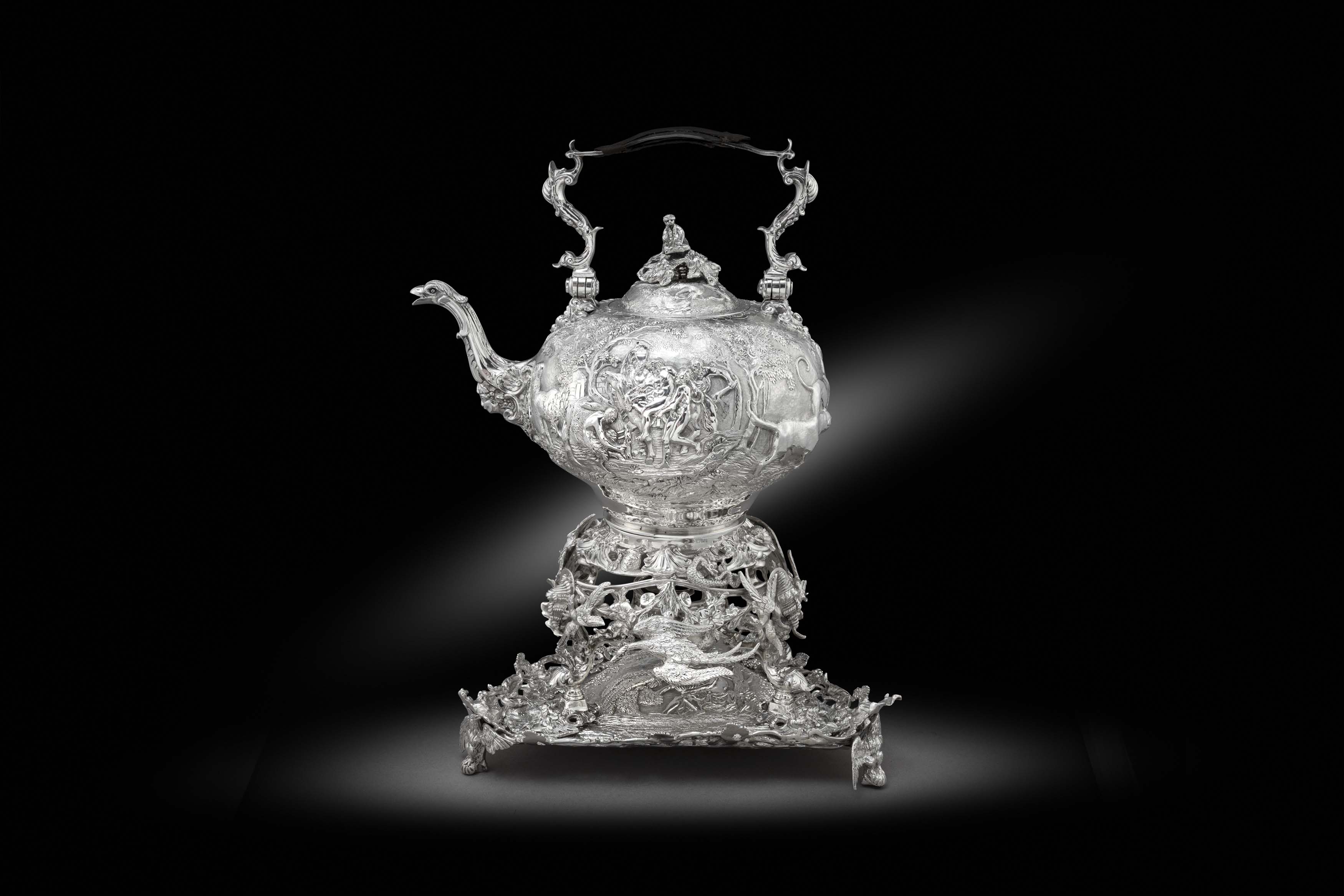 A Superb George III ‘Teniers’ Kettle, Warmer and Kettle Stand