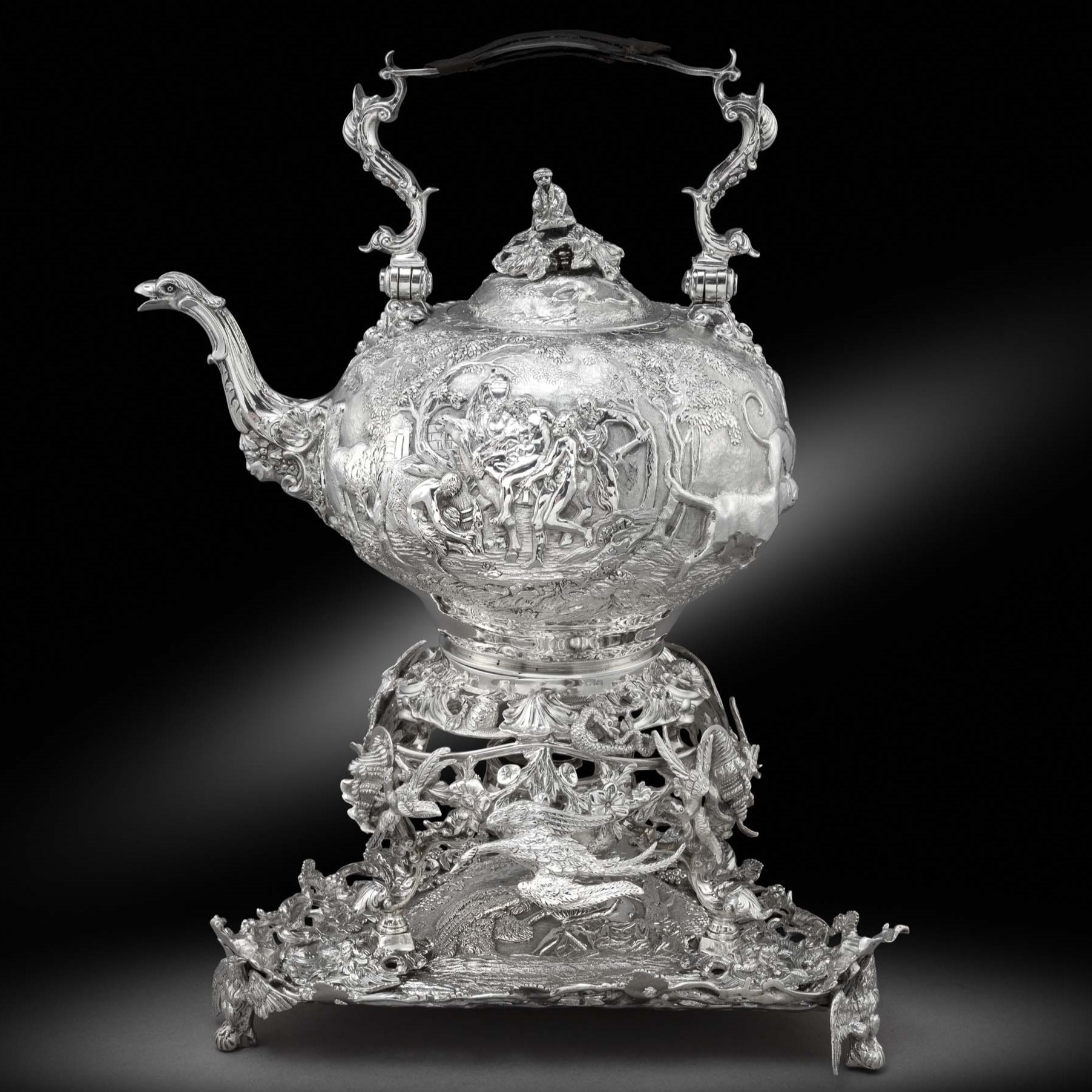 A Superb George III ‘Teniers’ Kettle, Warmer and Kettle Stand