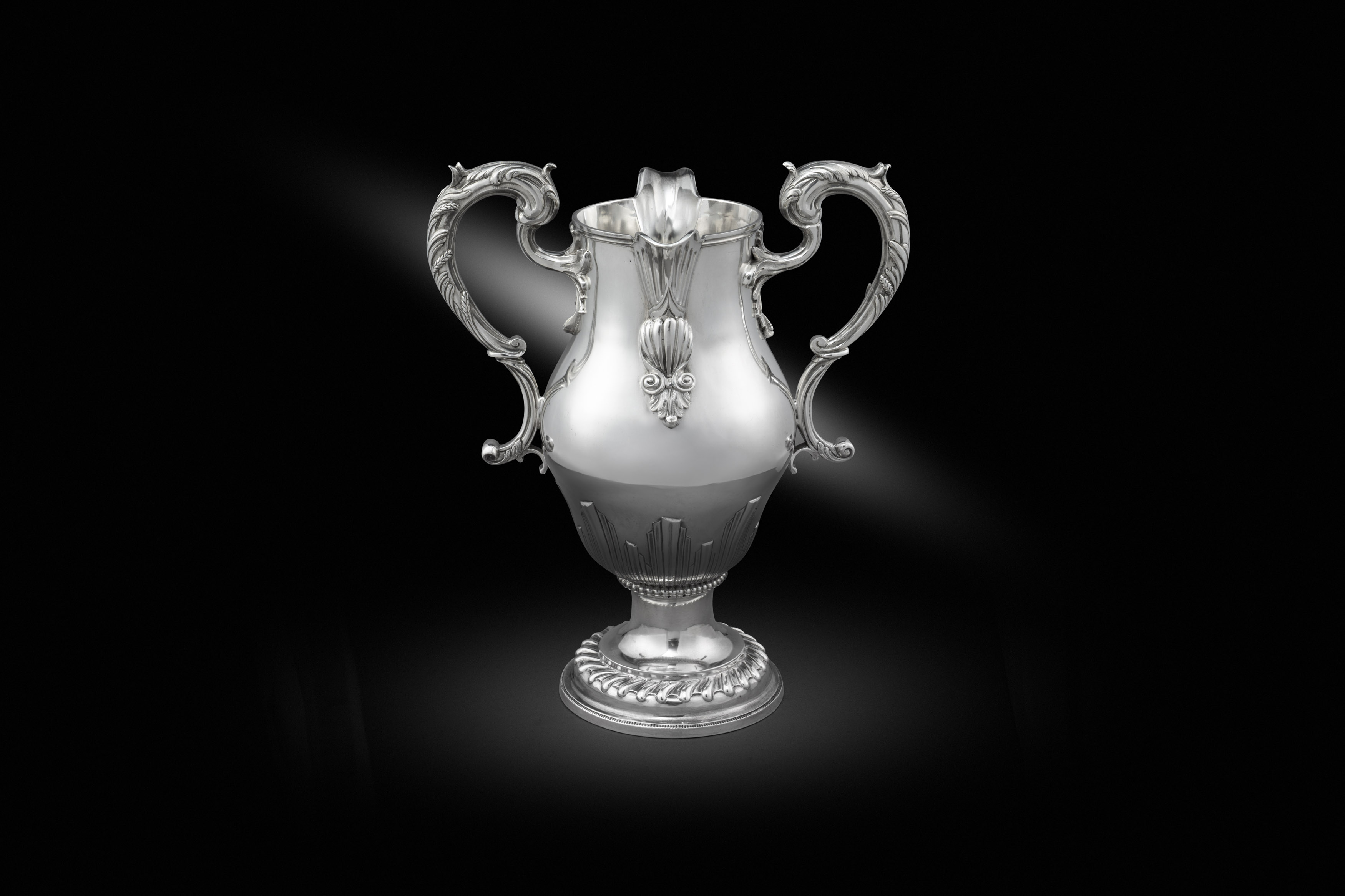 A George III Silver Double-Spouted Ewer