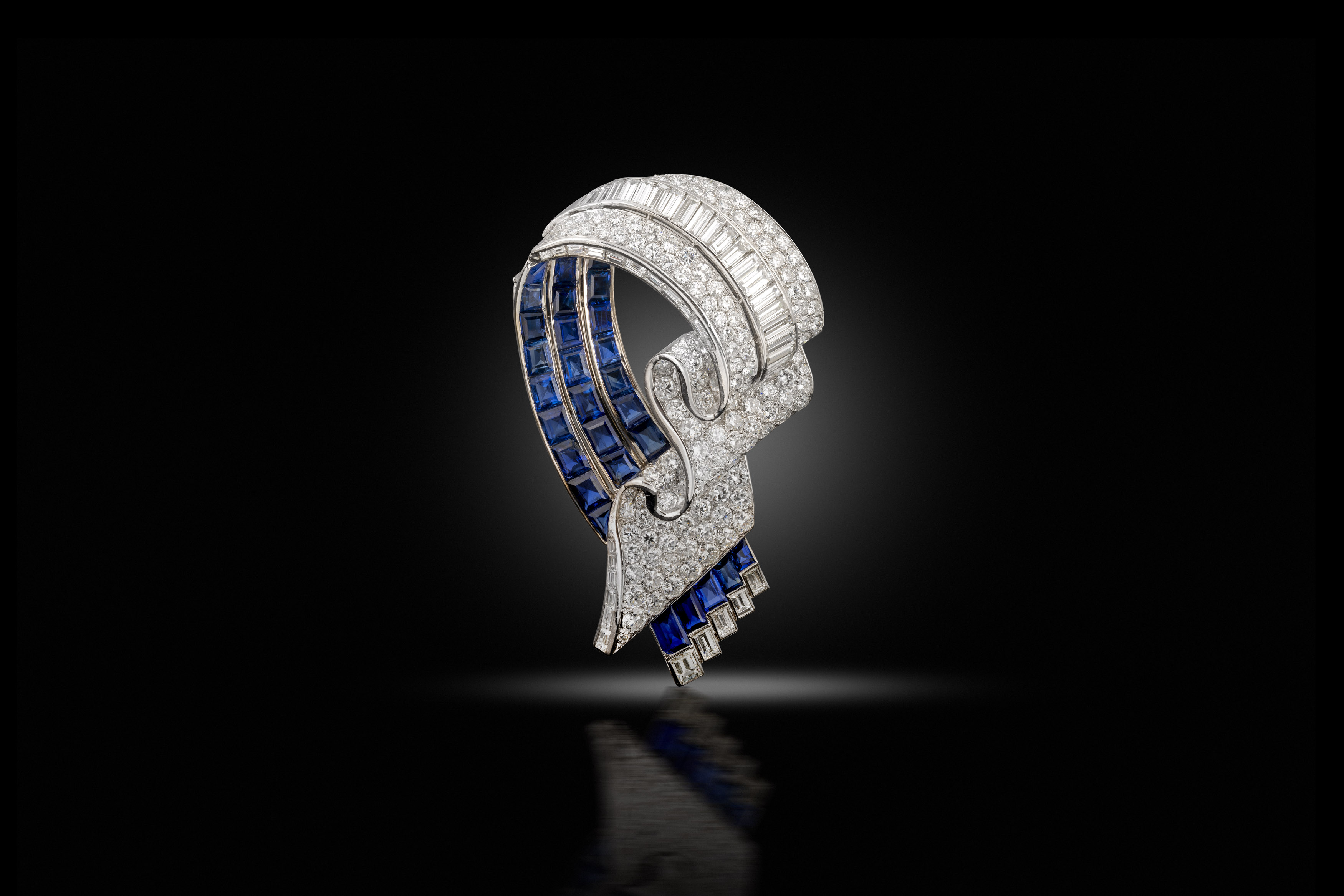 A mid-century sapphire and diamond clip, Sterle