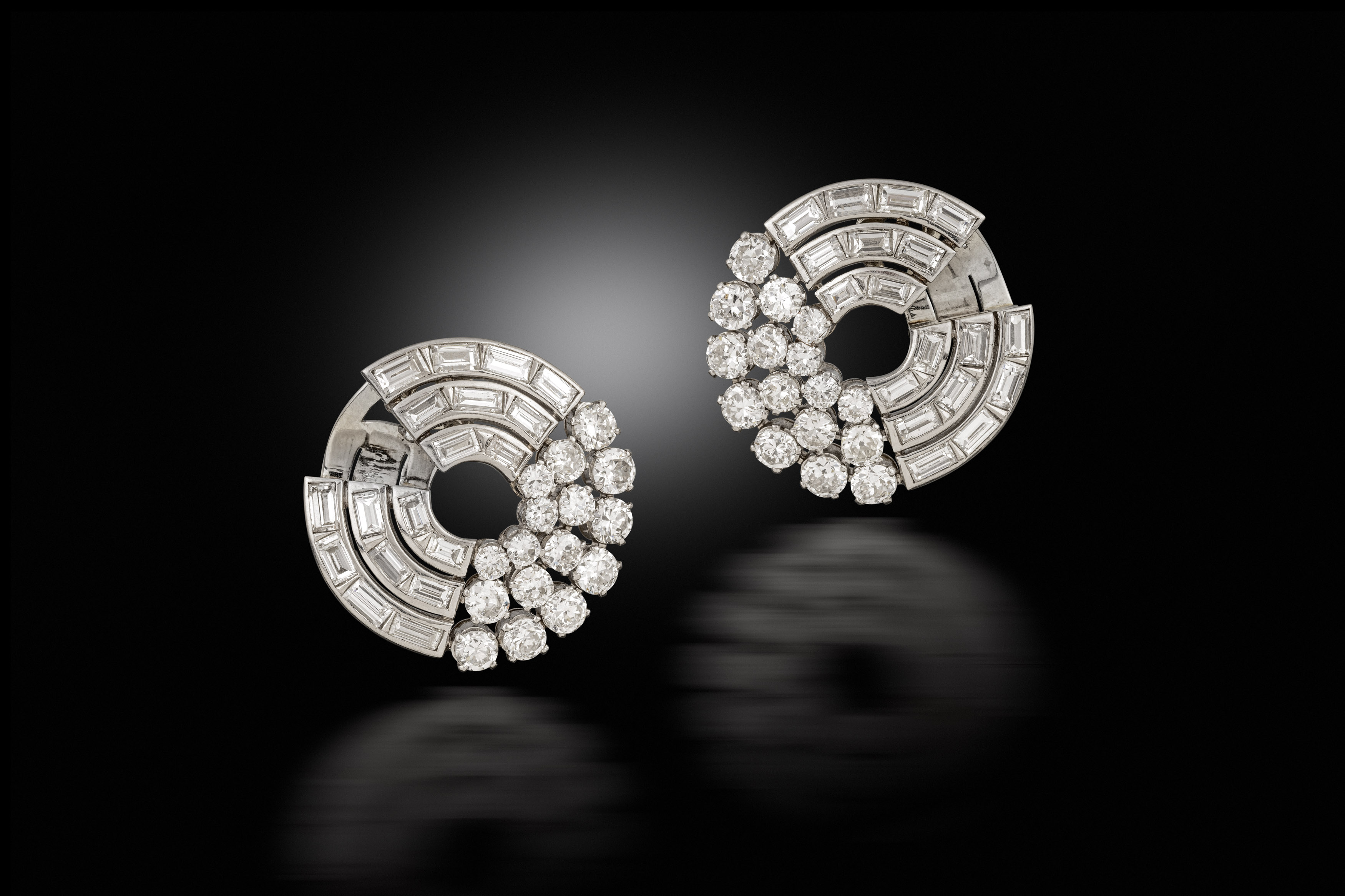 A pair of diamond earrings, circa 1935