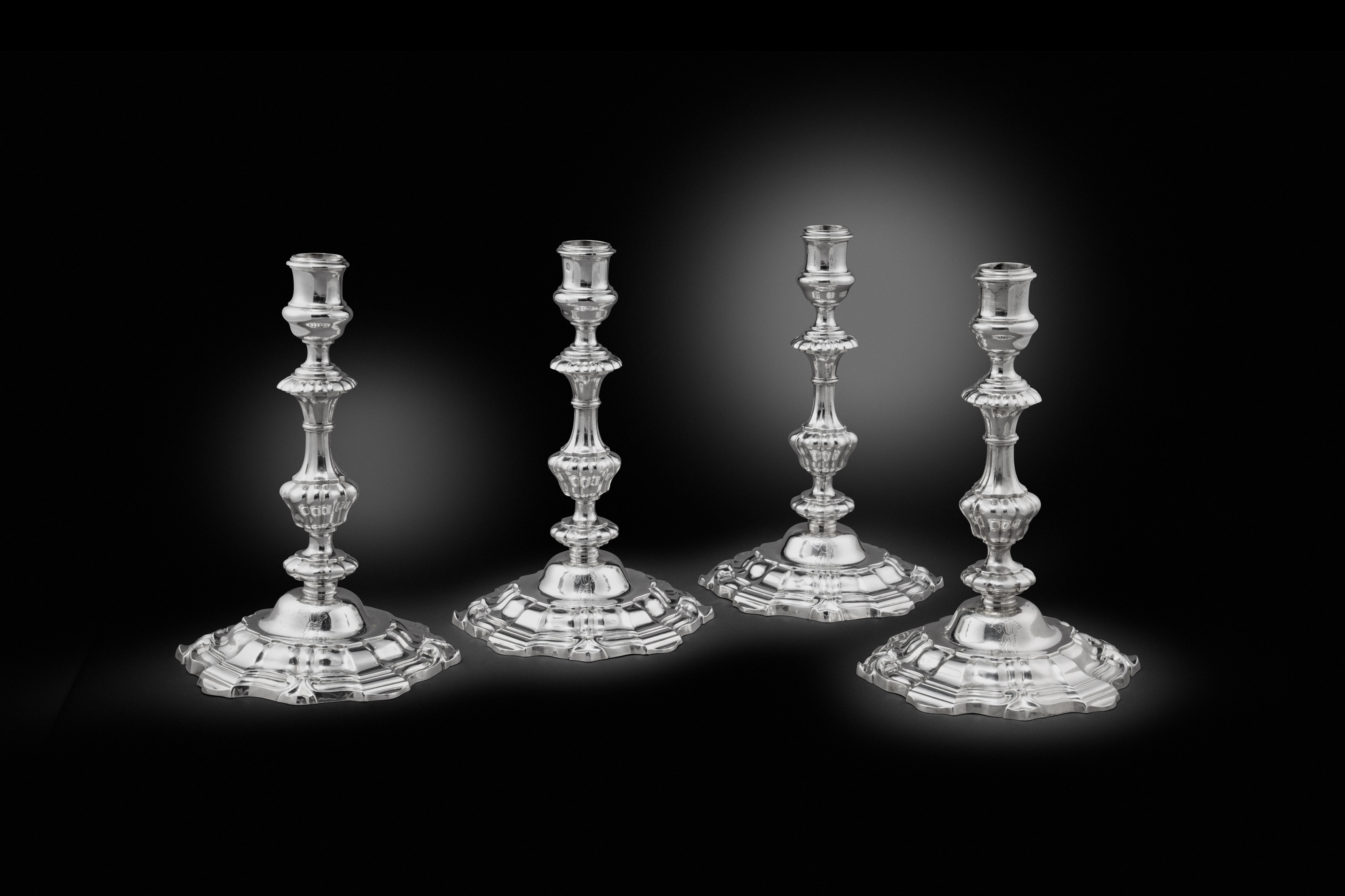 A Set of Four Unusual George II Candlesticks