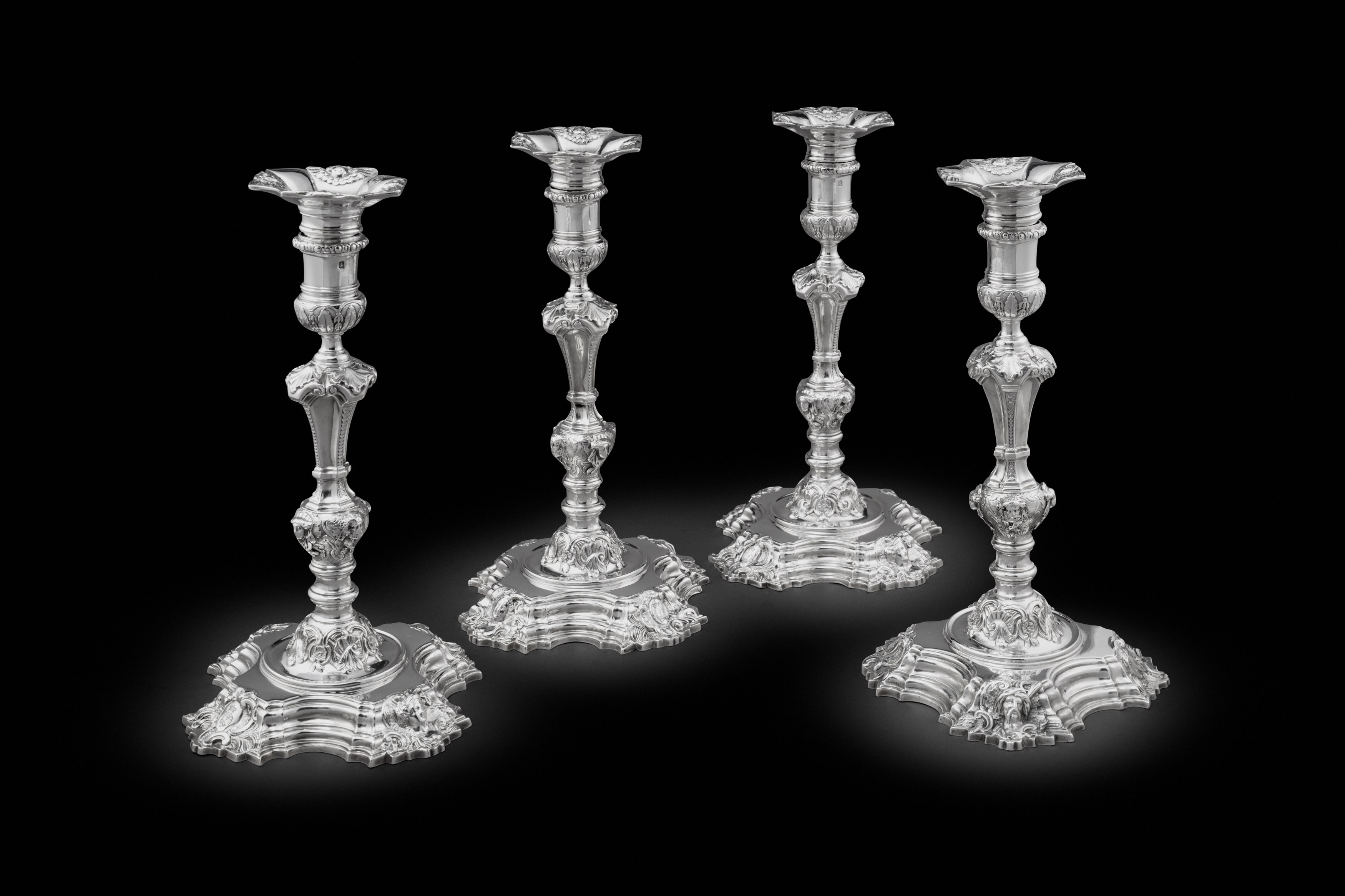 A Set of Four Unusual George II Candlesticks