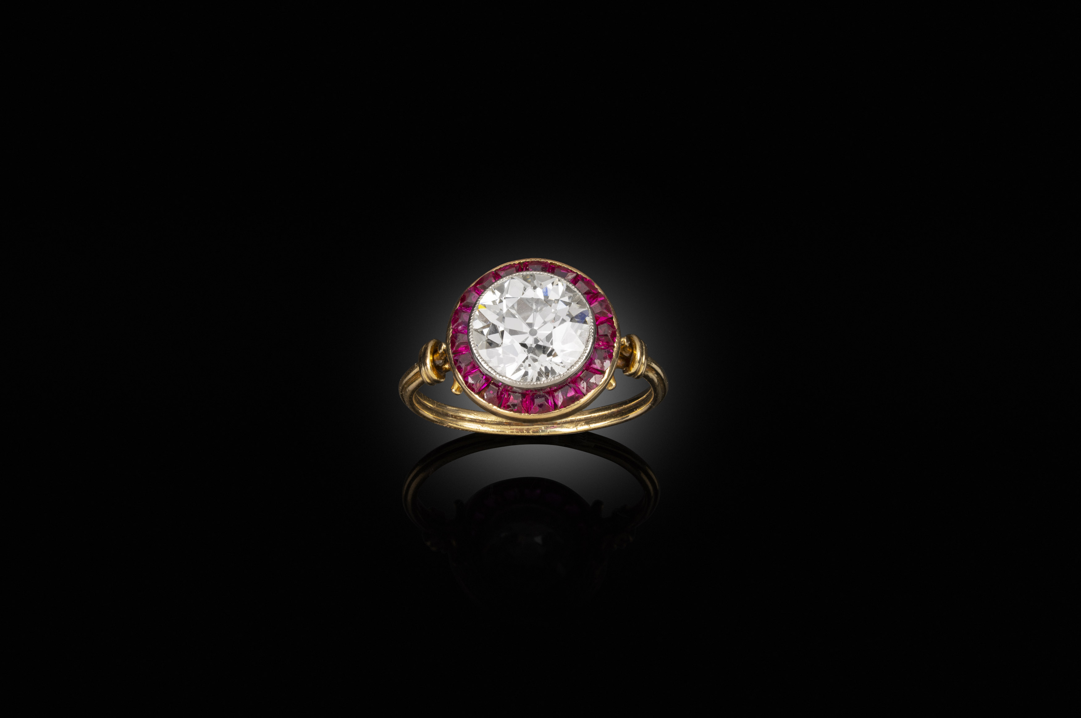 A ruby and diamond target ring, circa 1900
