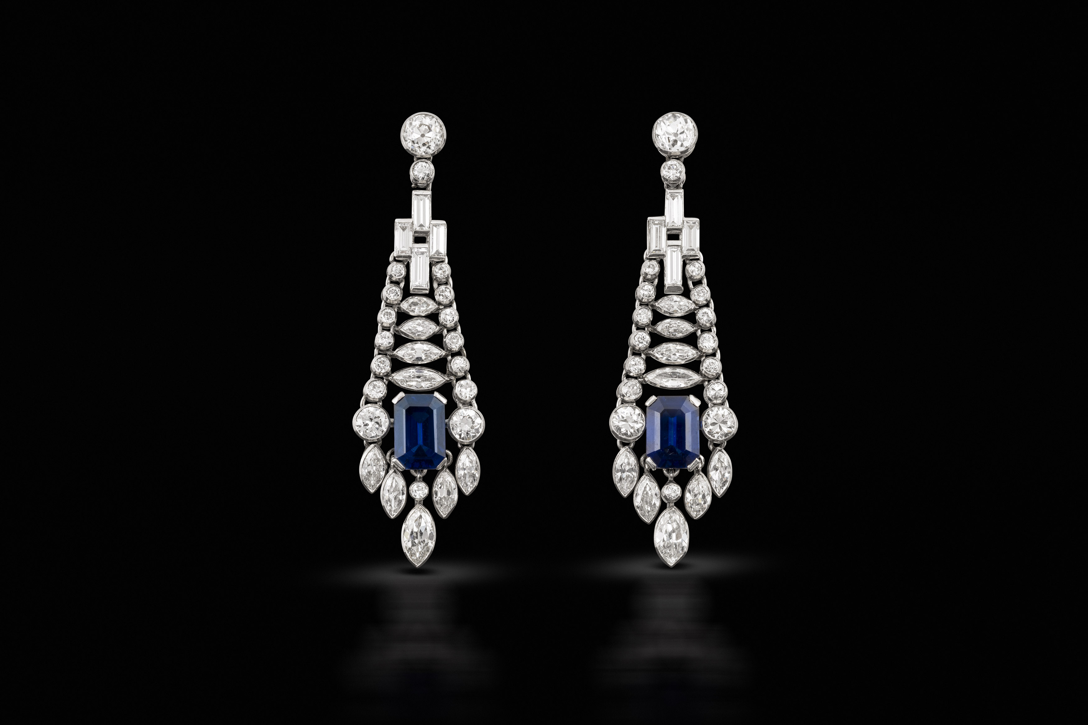 A pair of early art deco sapphire and diamond earrings