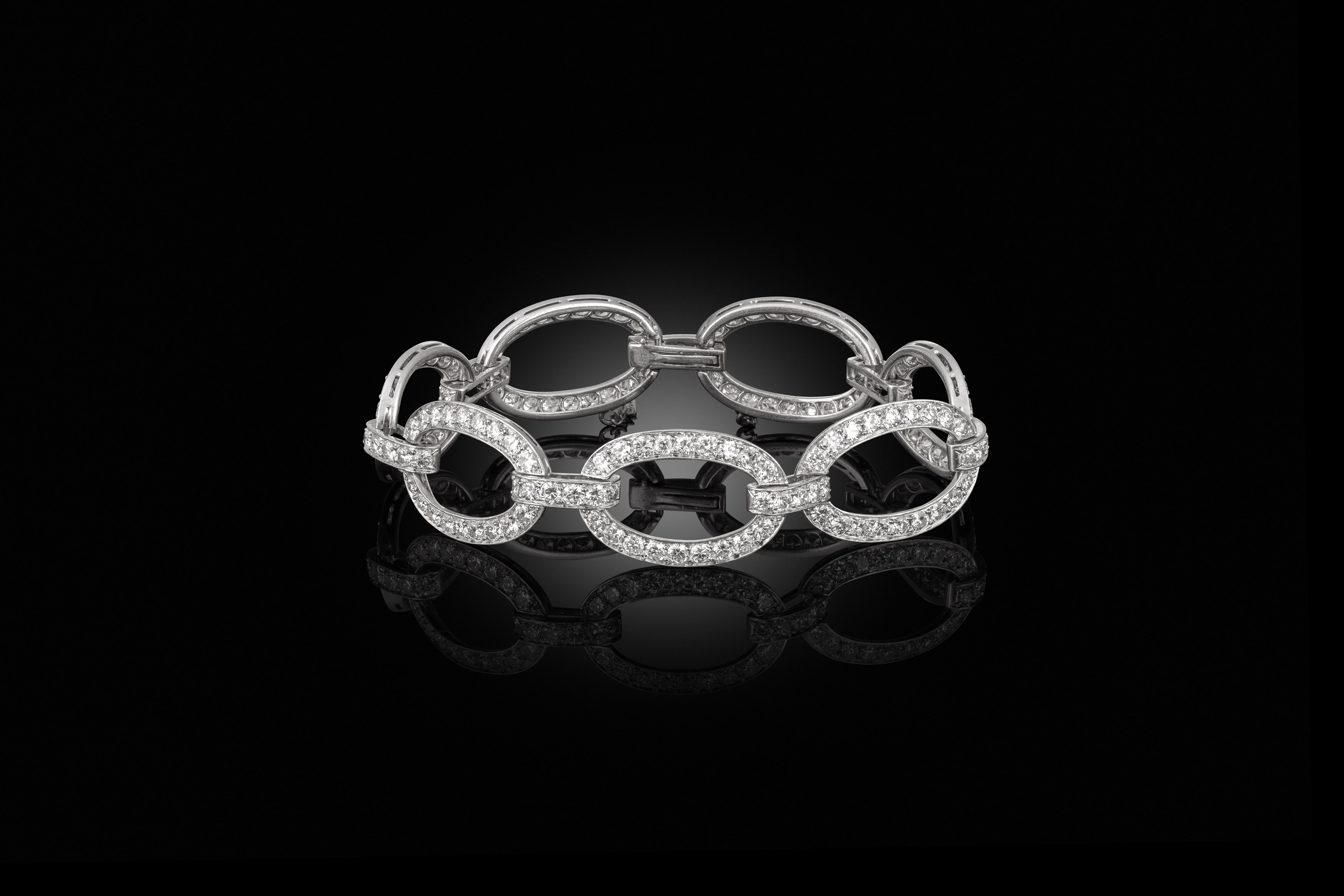 An oval link diamond bracelet, circa 1915
