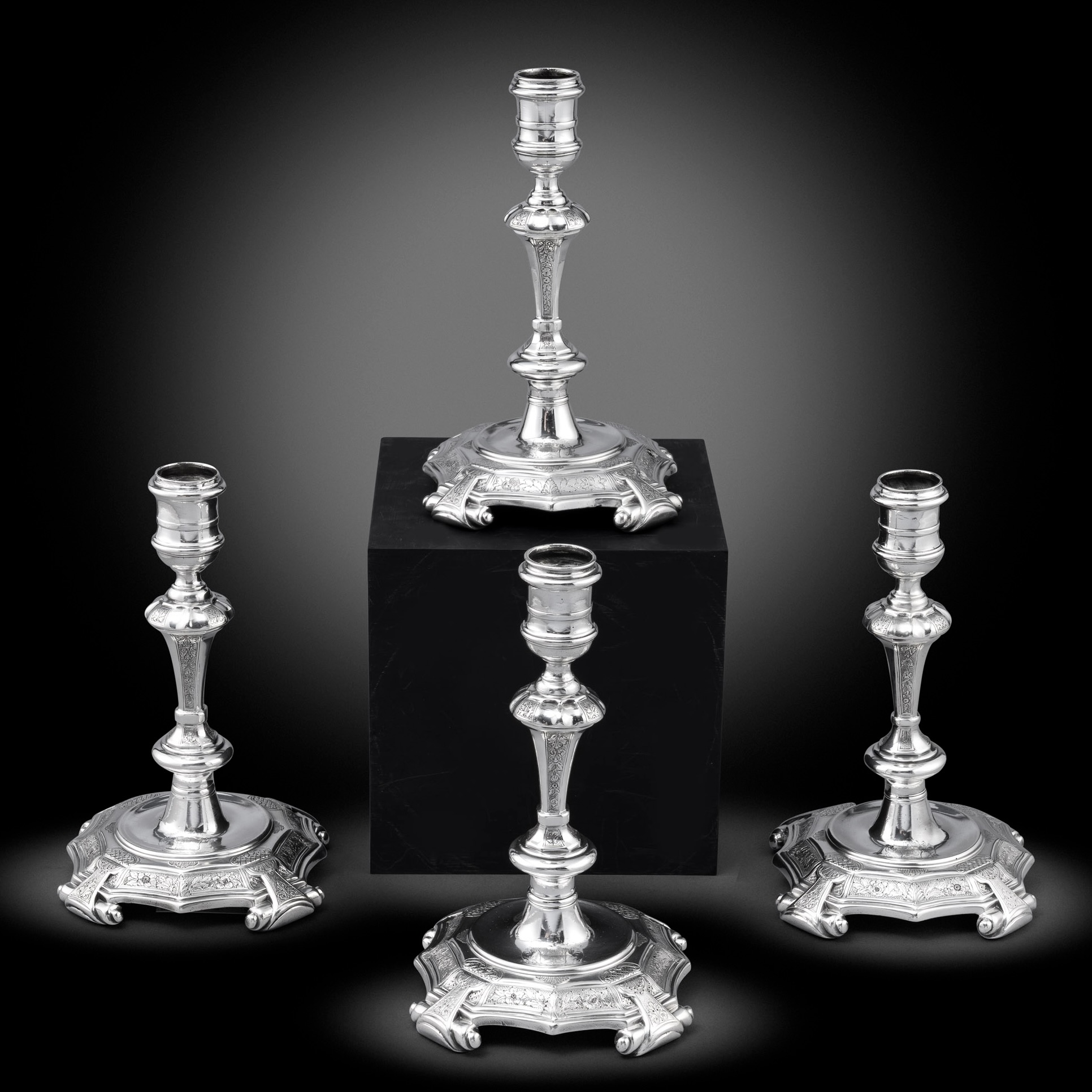 A Set of Four George II Silver Candlesticks