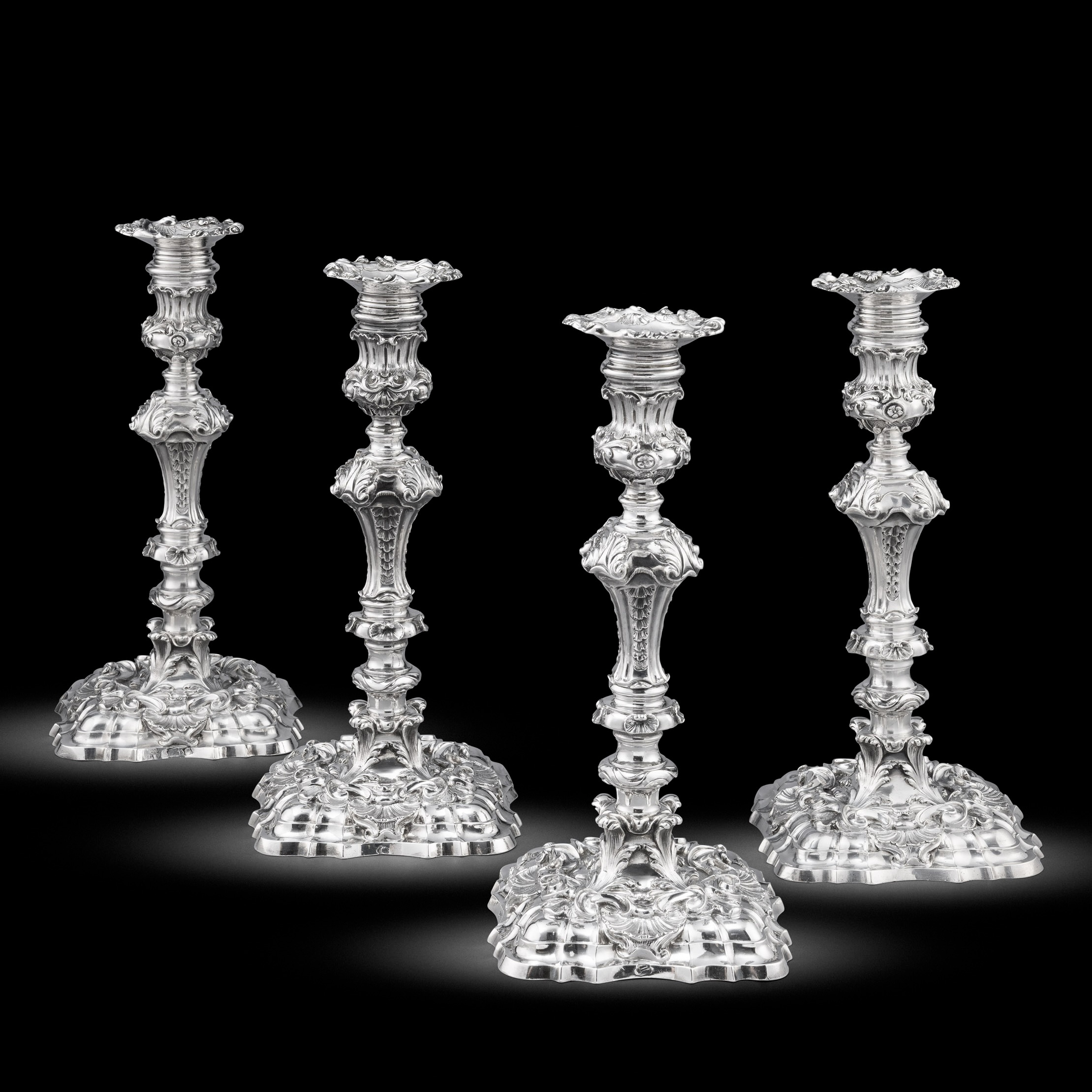 An Important Set of Four George II Table Candlesticks